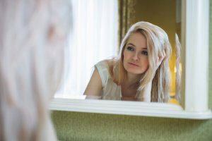 Women mirror blond reflection 